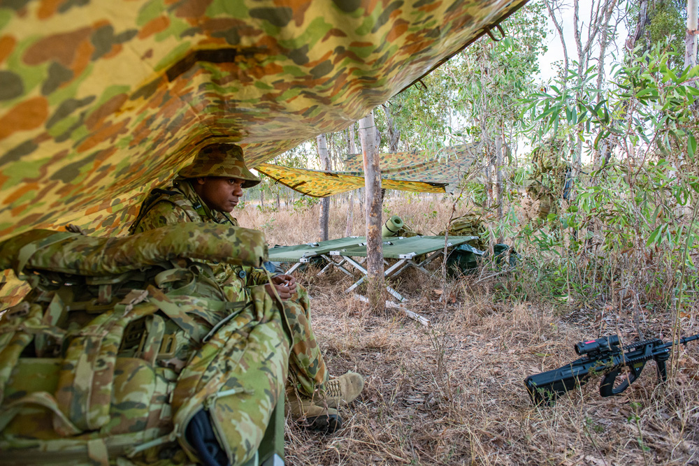 Private Corey Toby in his hutchie during the 51st Battalion patrolman course. The majority of this Far North Queensland Regiment is made up of reservists from remote areas and Aboriginal communities. Photo Ken Eastwood. Outback story Issue #122.